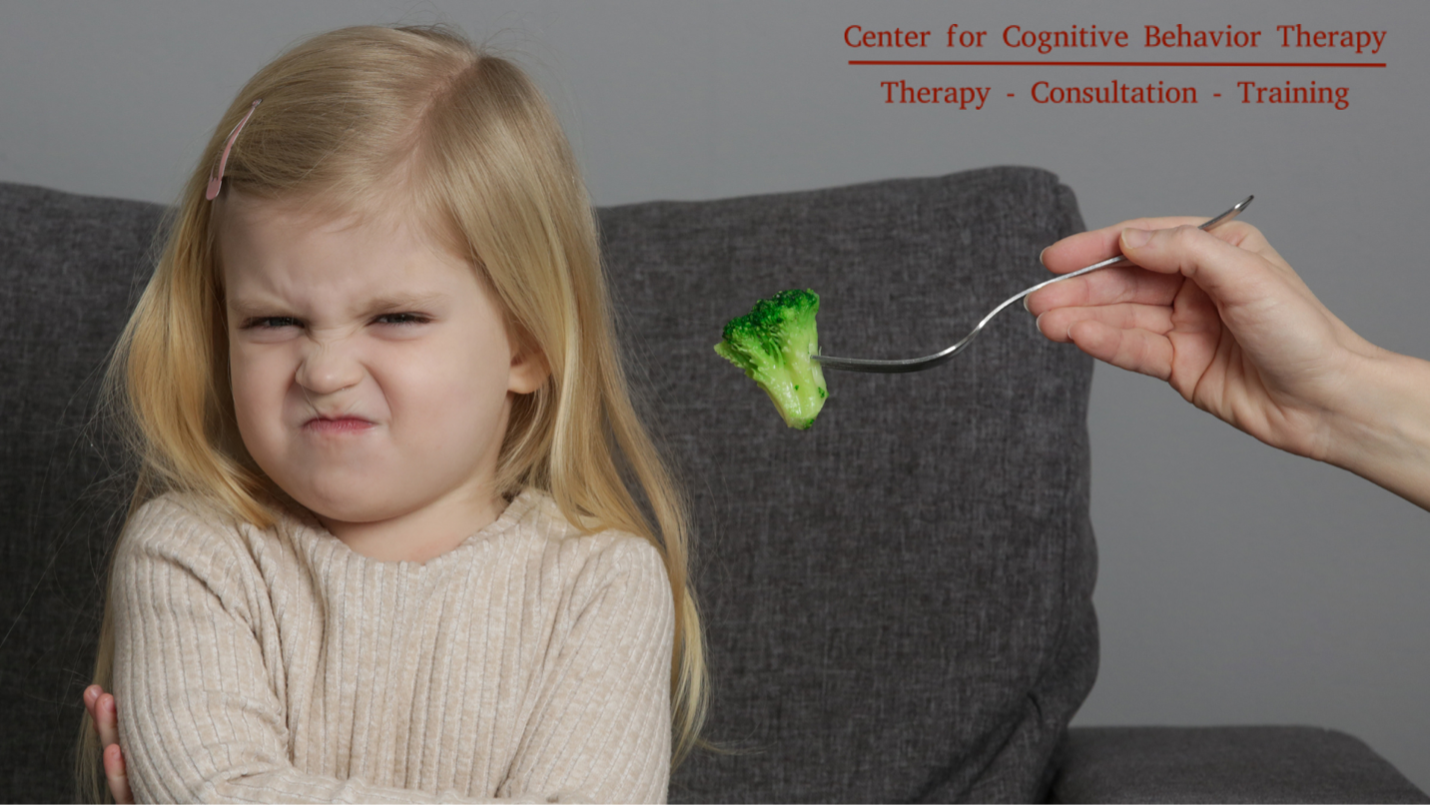 Child displaying signs of picky eating at mealtime