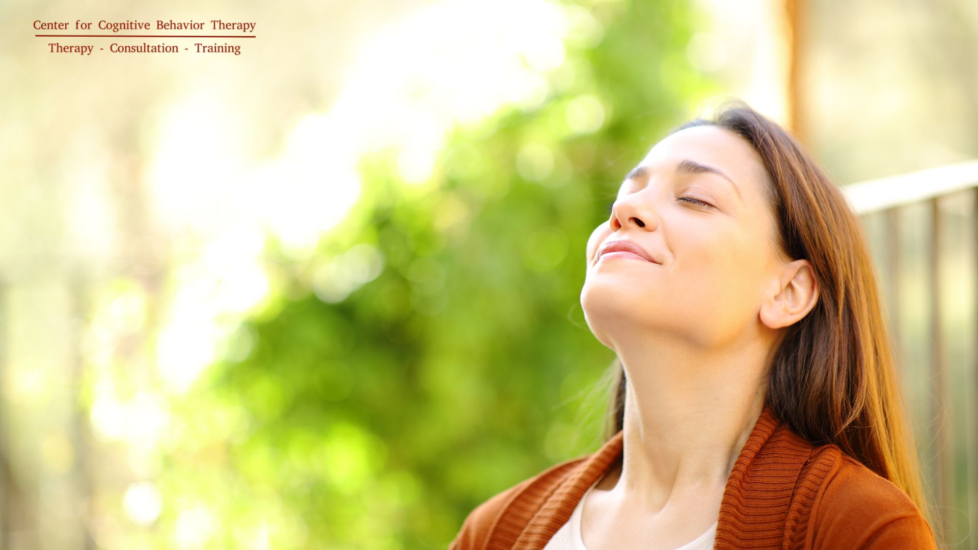 Person practicing self-soothe deep breathing in a serene natural environment.